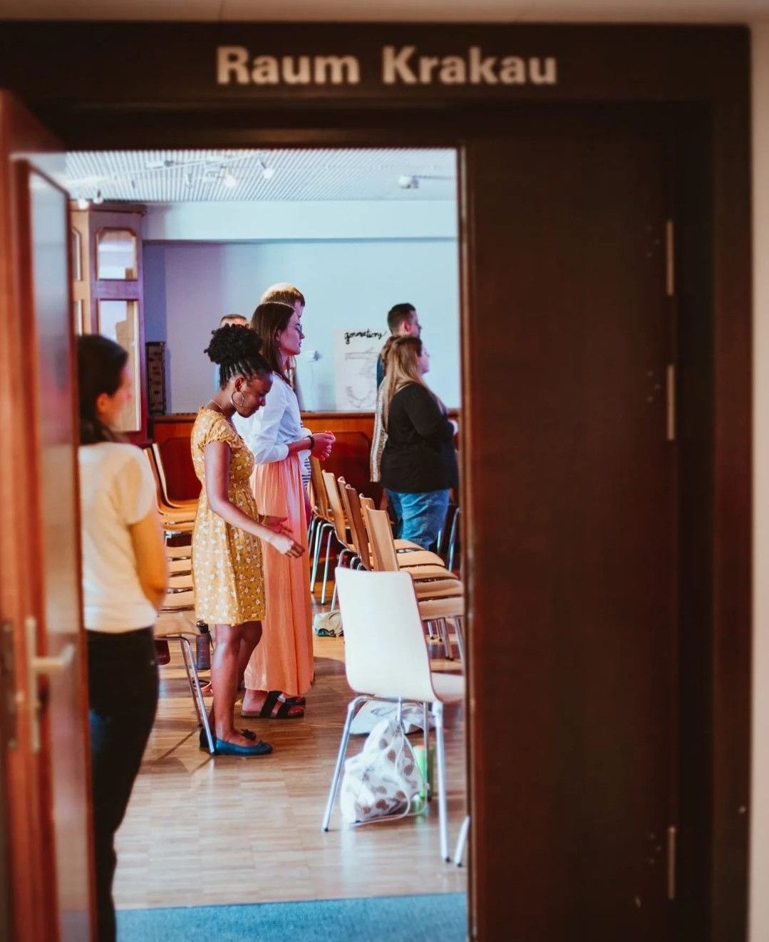 The open door to Room Krakau during a morning service